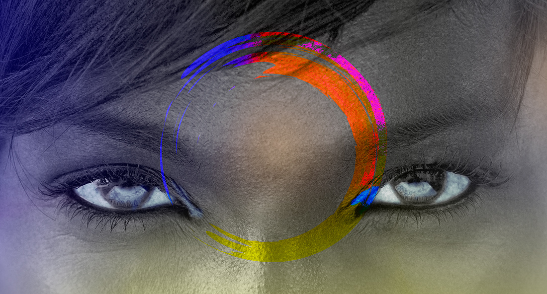 Close-up of a woman staring purposefully at the camera, a colorful circle outlining the so-called 